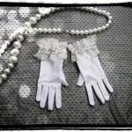 White and Silver Gemstone E..