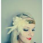 1920s cream and gold feathe..